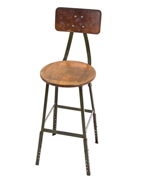 original 1940's pollard brothers four-legged riveted and welded steel adjustable height factory stool with original olive green enameled finish and maple wood seat