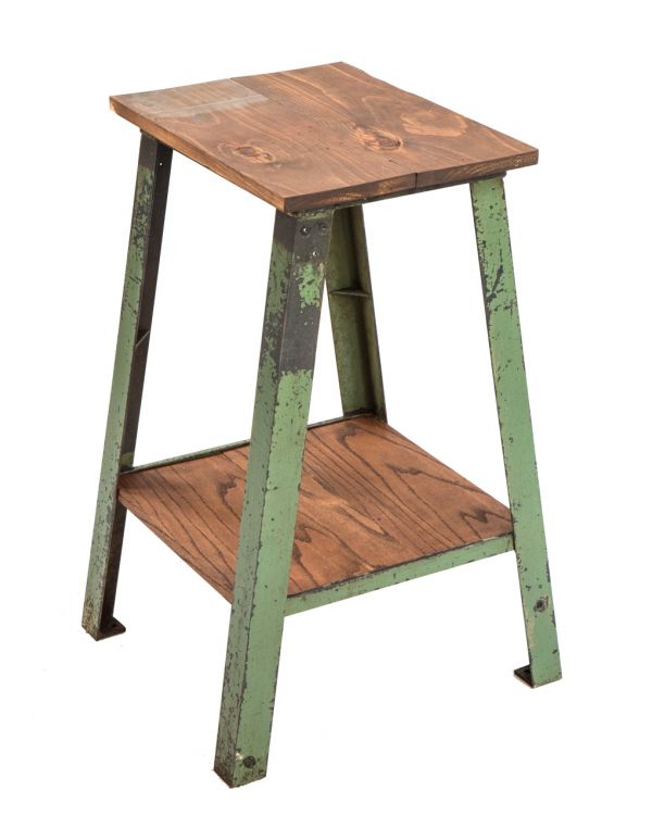 robust four-legged c. 1940's american industrial salvaged chicago angled steel stationary two-tier stand or side table with old factory green paint finish 