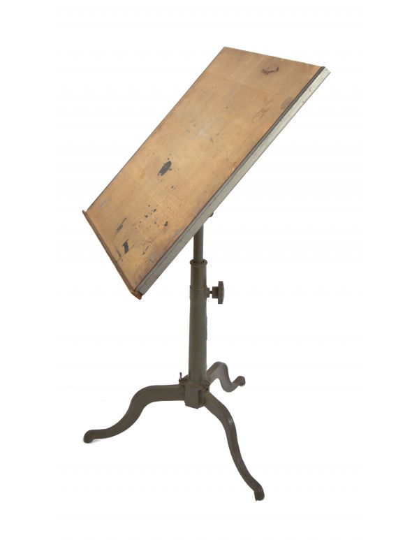 single early 20th century original and intact salvaged chicago cast iron three-legged drafting table with adjustable height telescoping post base