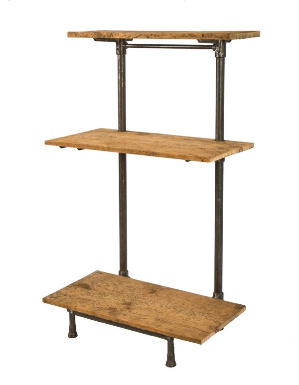 repurposed antique american industrial freestanding early 20th century adjustable shelving unit with detachable cast iron brackets and newly added old growth pine wood shelves   