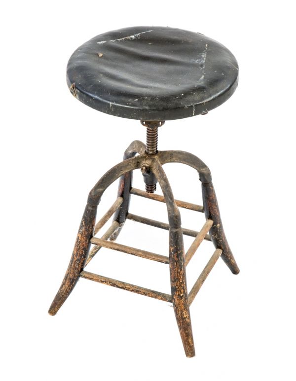 early 20th century original and fully functional adjustable height dietzgen drafting stool with amazingly intact black leather cushioned seat and tapered legs
