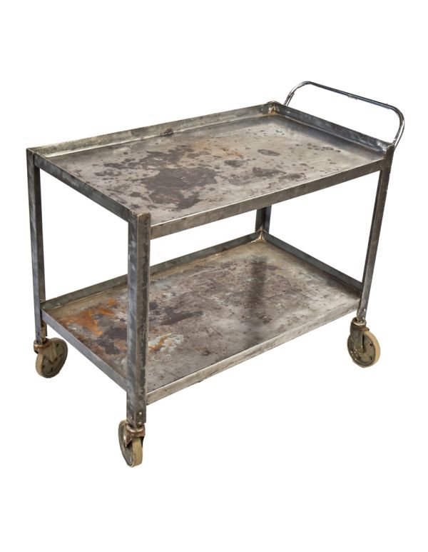 c. 1940's american vintage industrial all-welded joint two-tier mobile steel push cart with fully functional casters and bent tubular handle 