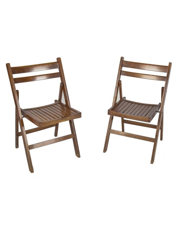 two matching original  c. 1920's antique american industrial solid maple wood chicago hotel ballroom folding chairs with uniform stained finish 