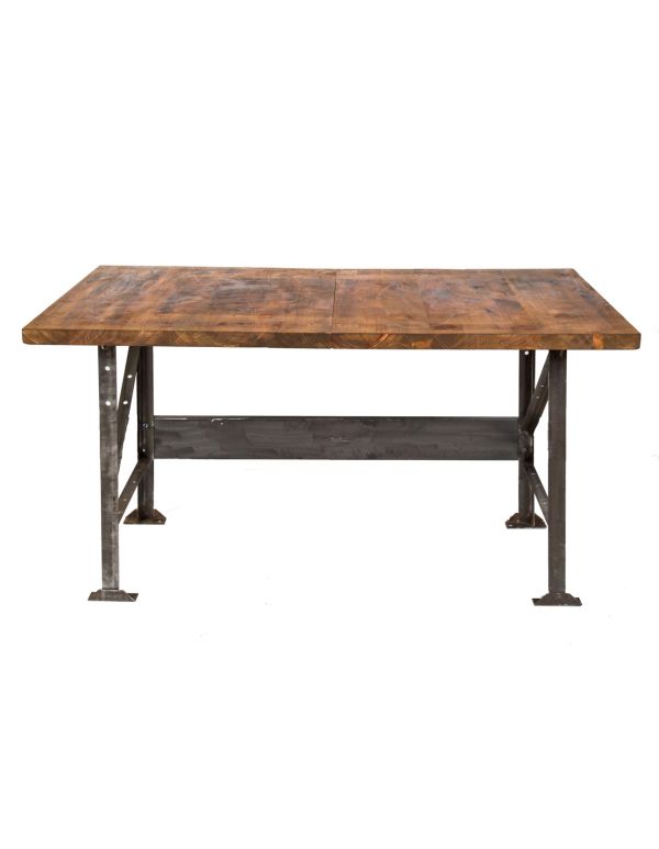 repurposed oversized vintage american industrial pollard brothers stationary salvaged chicago machine shop table or workbench with brushed metals legs and newly added tabletop  