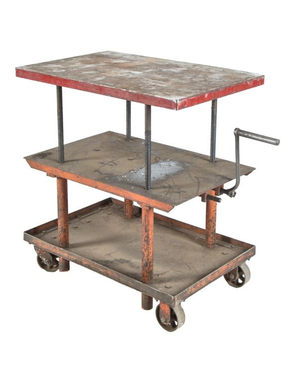 one of four nearly identical fully adjustable salvaged chicago three-tier heavy duty die cart or hand-crank table with perforated cast iron casters 