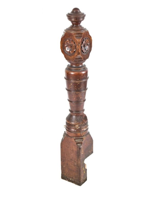 nicely turned and tapered 19th century antique american victorian era solid oak wood interior residential newel post with hand carved floral rosettes and graduating rings  
