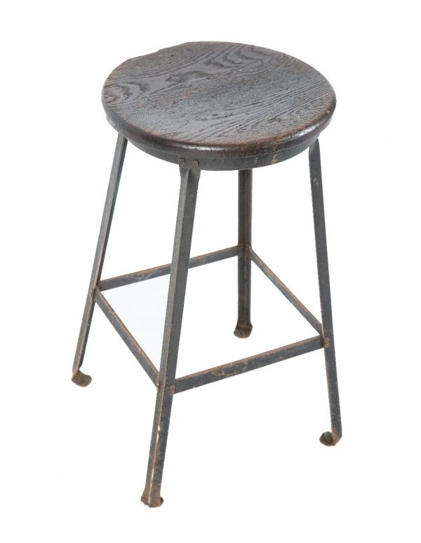 salvaged chicago weathered and worn four-legged riveted joint angled steel factory stool with solid oak wood seat