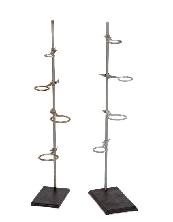 two nearly identical oversized early 20th century salvaged chicago university laboratory retort stand with adjustable ring clamps