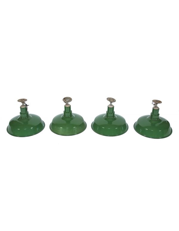 group of four matching early 20th century salvaged chicago green porcelain enameled benjamin factory pendant lights 
