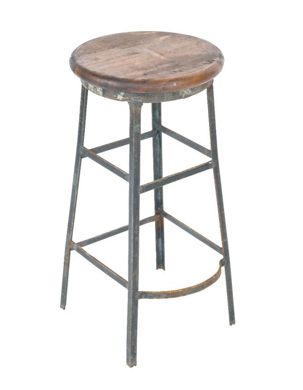all original depression-era salvaged chicago factory machine shop stool with angled steel legs and maple wood seat