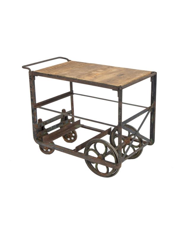unusual customized vintage american industrial salvaged chicago furniture factory angled iron cart with stationary and swivel casters