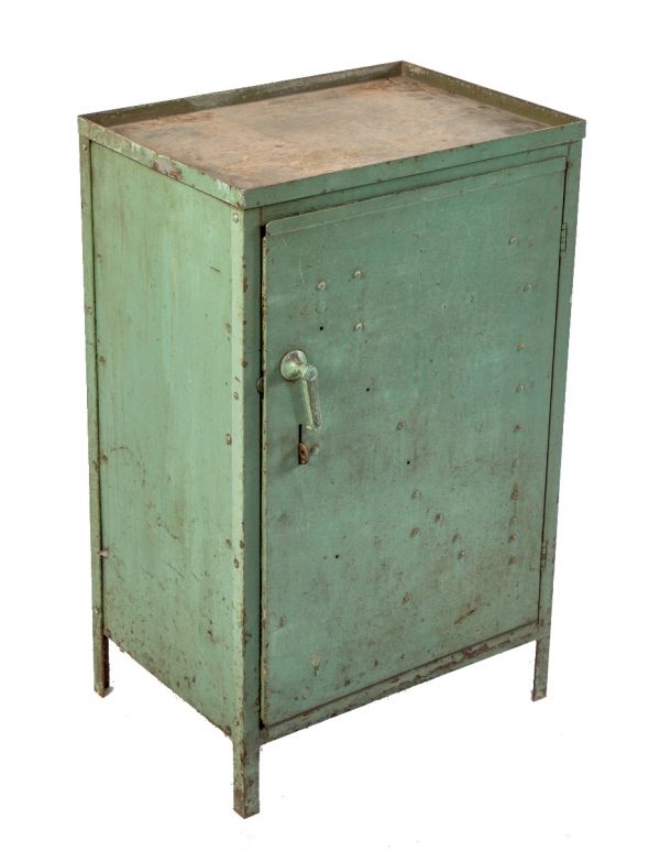 original vintage american industrial cold-rolled steel freestanding factory machine shop storage cabinet with old green paint finish 