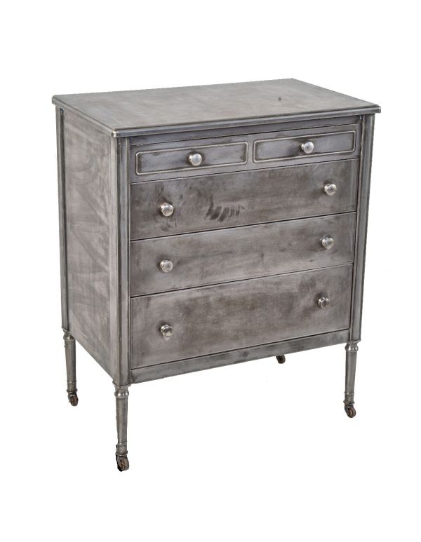one of two matching original salvaged chicago brushed steel multi-drawer simmons dresser with tapered legs 