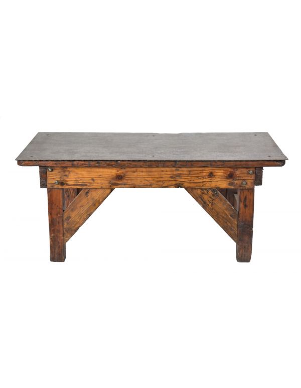 early 20th century antique american industrial salvaged chicago four-legged factory machine shop table with steel deck 