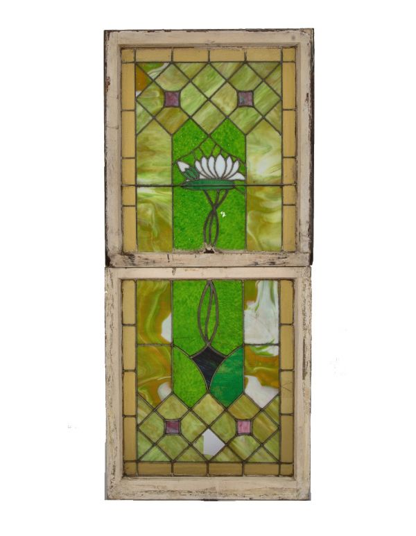 original and largely intact interior residential double-hung stained glass residential window with centrally located floral motif 
