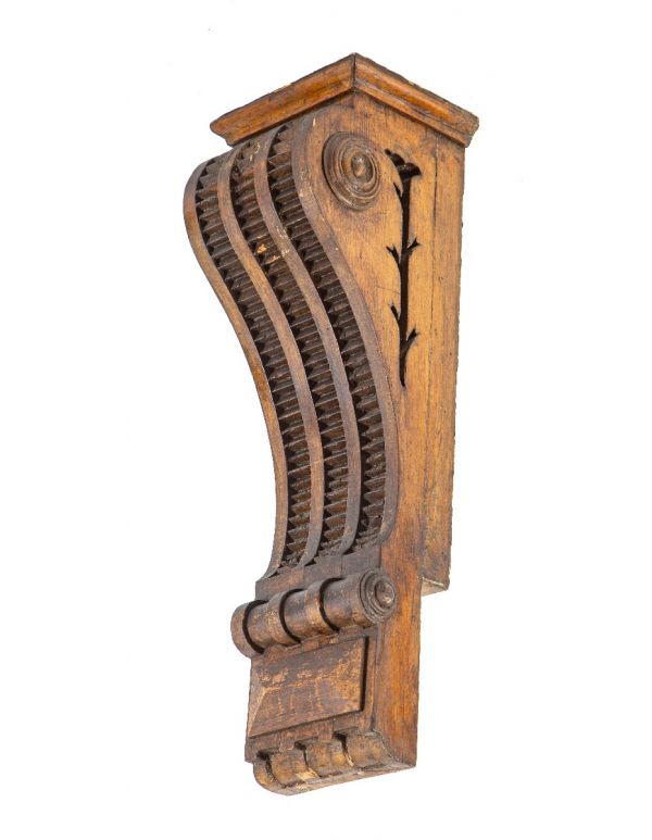 original 19th century salvaged chicago oversized oak wood entrance door corbel with deeply incised floral motifs 