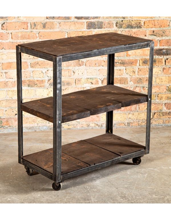 vintage american industrial chicago three-tier mobile factory workshop cart with darkly stained pine wood shelves