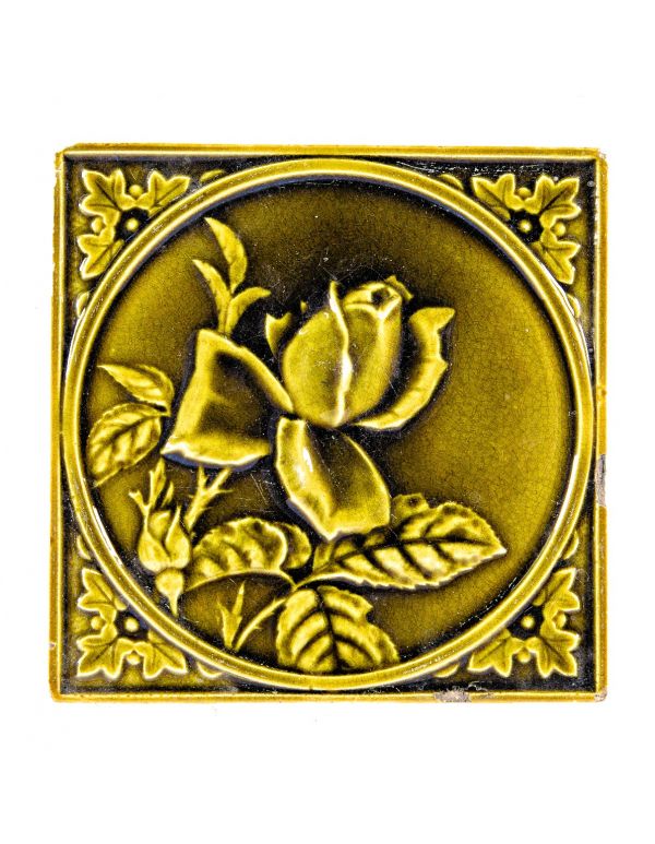 dark olive green salvaged majolica interior residential fireplace tile with encircled rose and allover crazing 