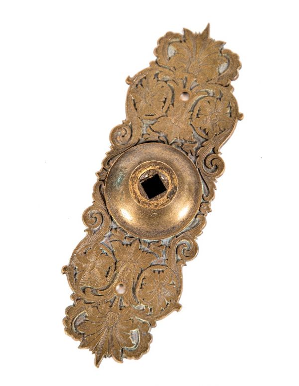 seldom found 1870's original and nicely patinated "compression cast" residential bronze metal exterior residential doorbell pull backplate or escutcheon