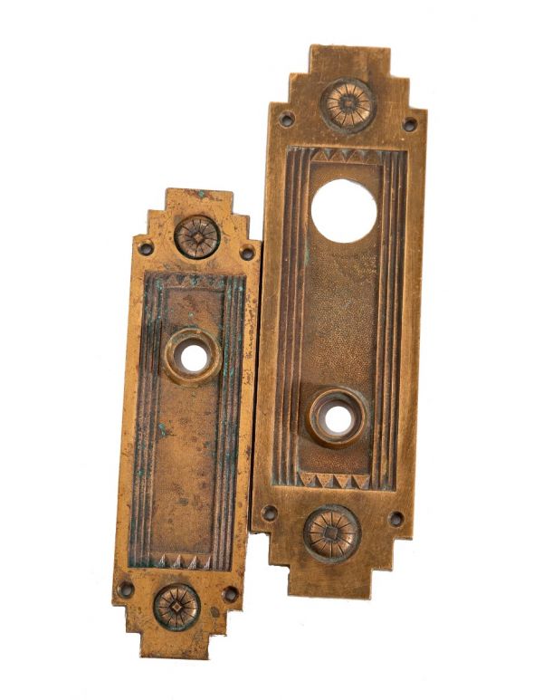 matching set of holabird and root-designed oranamental cast bronze art deco palmolive building office door backplates 