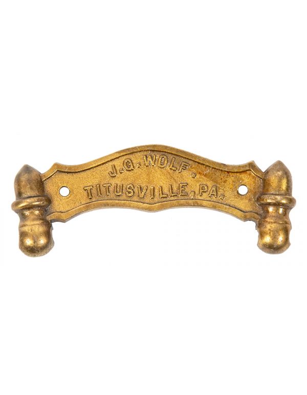 Single late 19th century antique american ornamental cast bras interior residential lavatory or bathroom toilet paper holder backplate