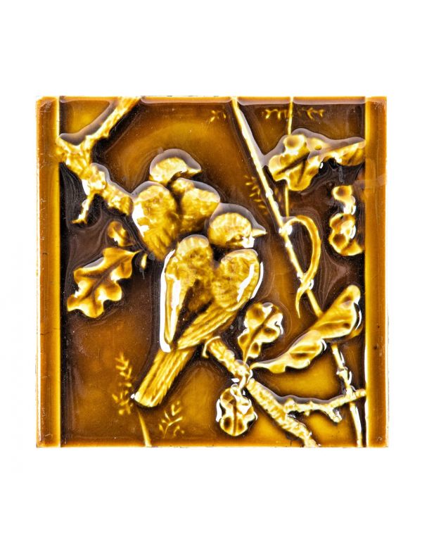 original 19th century antique american salvaged chicago richly colored mottled brownish-yellow figural fireplace tile with winged bird