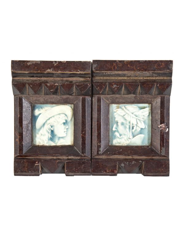 pair or set of original 19th century american ornamental oversized cast iron fireplace mantel keystones integrated with figural tiles