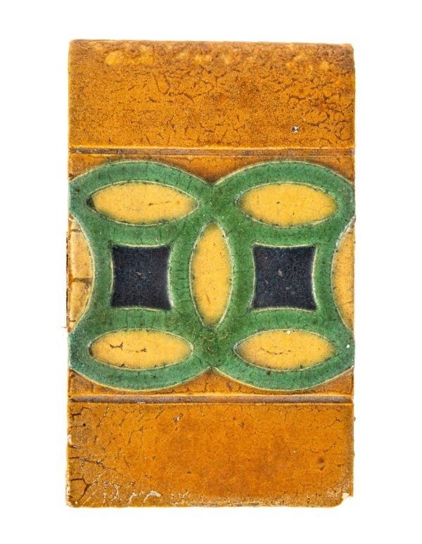original claude bragdon-designed strongly geometric new york central station grueby tile with richly colored glaze 