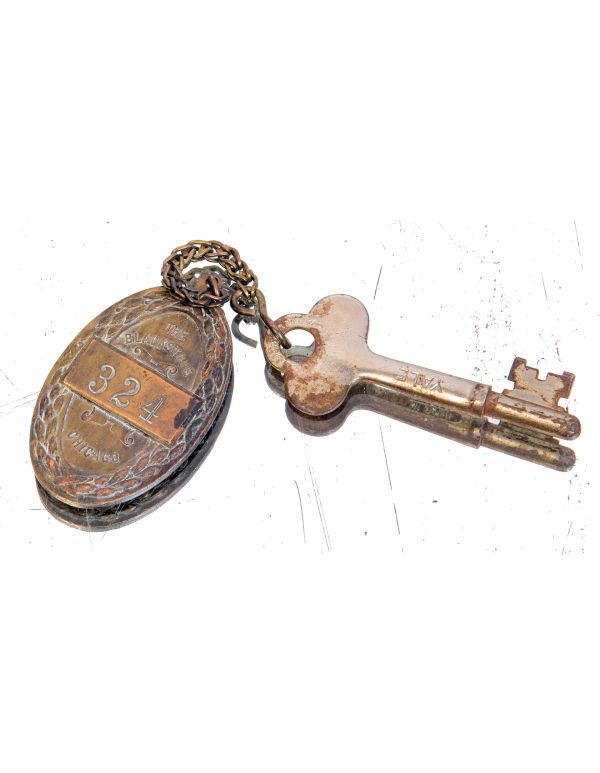 early 20th century original salvaged chicago blackstone hotel ornamental cast bronze guest room key fob with nickel-plated skeleton key