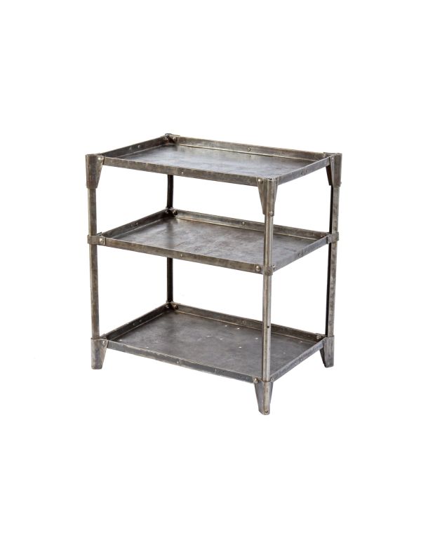 early 1930's antique american industrial freestanding pressed and formed steel stationary "uhl art steel" tool stand with riveted joint reinforced corner guards