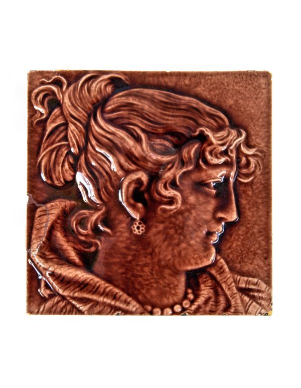 original burgundy-colored majolica glazed figural trent tile salvaged from a chicago residence built in the 1890s