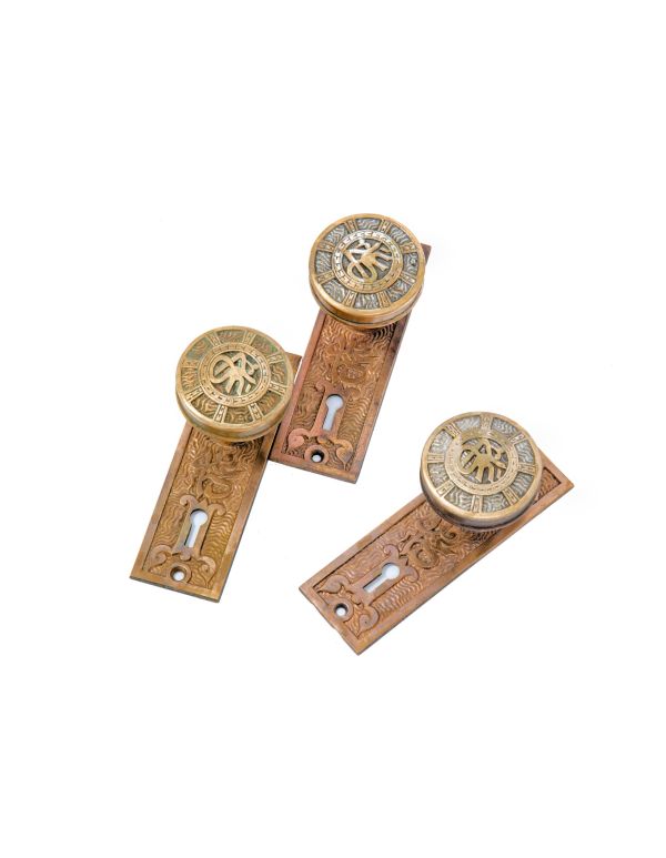original 19th century ornamental cast brass "arabic" pattern mallory & wheeler doorknobs and backplates 