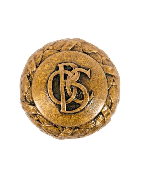original holabird and roche-designed old colony buildng monogrammed interior office doorknob with laurel wreath border