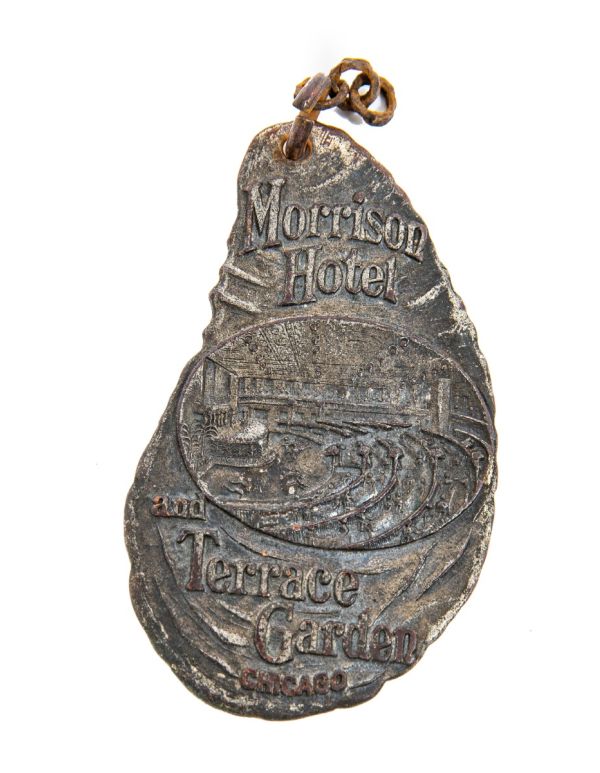 richly ornamented early 20th century original double-sided hotel morrison guest room key fob with garden terrace 