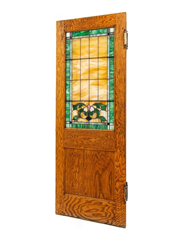 two of two original and largely intact early 20th century salvaged chicago south side chicago funeral parlor stained glass oak wood door