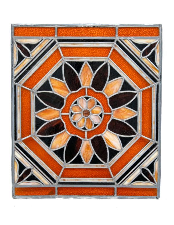 unusual 1890-1910 intact custom-designed  american victorian leaded stained glass window with geometric floral motif and centrally located jewel 