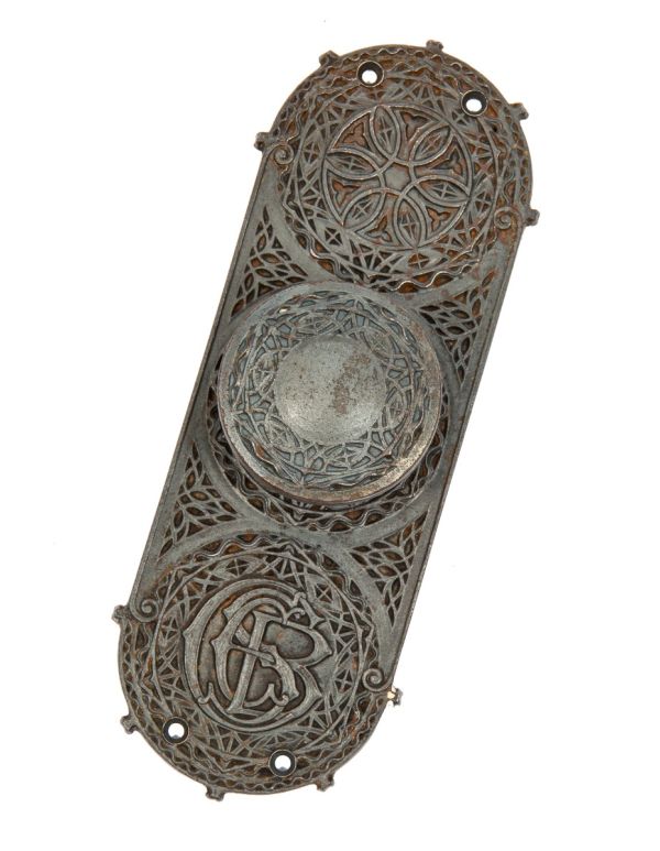 original louis h. sullivan-designed ornamental cast iron chicago stock exchange monogrammed backplate with matching doorknob 