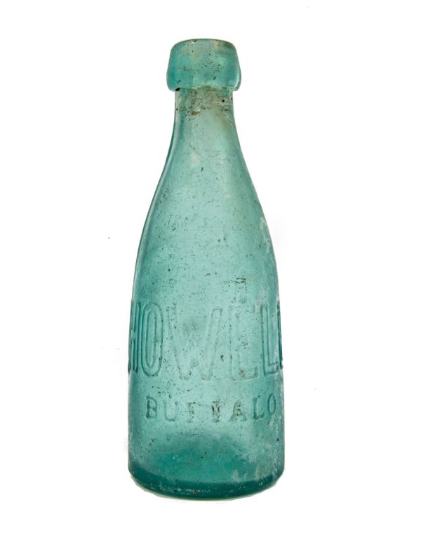 civil war-era aqua blue pony style glass soda bottle manufactured for howell and smith in buffalo, new york.