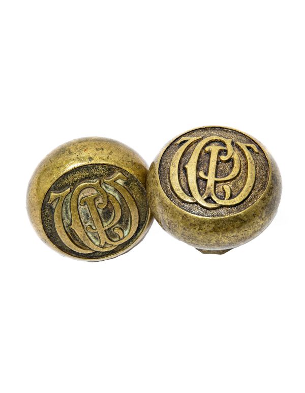 two matching late 19th or early 20th century cast brass monogrammed chicago public works building doorknobs
