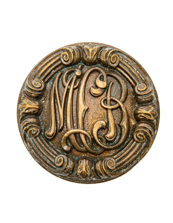 original early 20th century custom-designed ornamental cast bronze monogrammed roanoke building doorknob