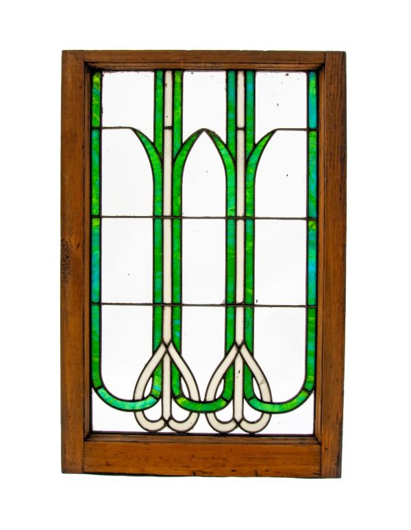 richly colored original early 20th century amerian art nouveau style leaded glass window with wood sash frame