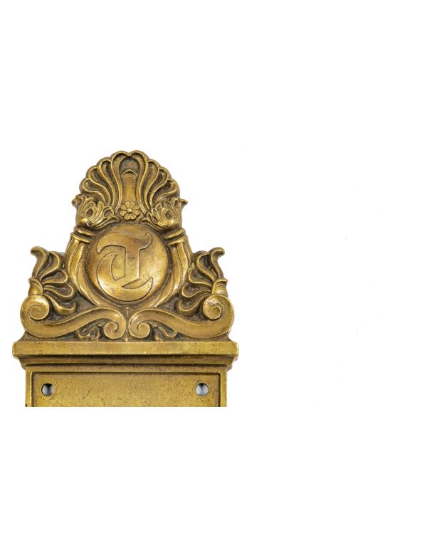 original 1901 holabird and roche-designed cast brass tribune building office door backplate and doorknob