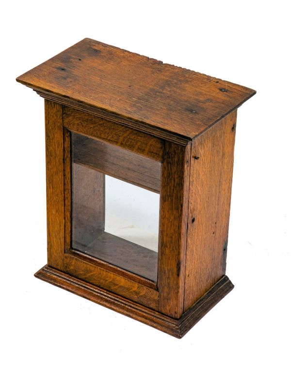 original early 20th century solid oak wood counter top display cabinet with hinged door and single shelf