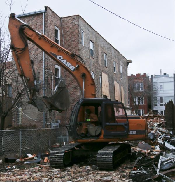 demolition of heavily modified 1885 chicago brick worker's cottage well underway