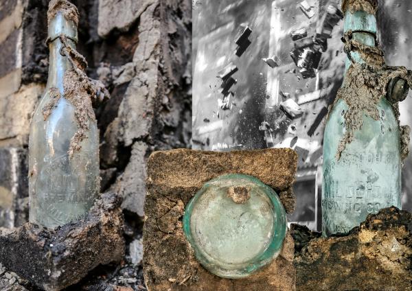 tradesman's beer bottle discovered in the wall of a 19th century chicago cottage undergoing demolition