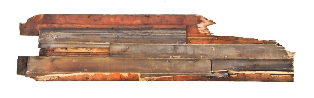 system fragment with intact clapboard nailed (with cut nails) to sheathing