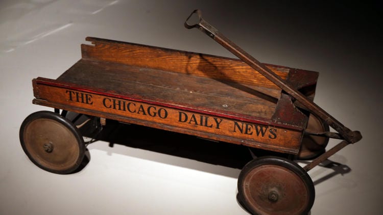 Phil Velasquez / Chicago Tribune A 1900 Chicago Daily News delivery wagon at "The Secret Lives of Objects" exhibit at the Chicago History Museum.
